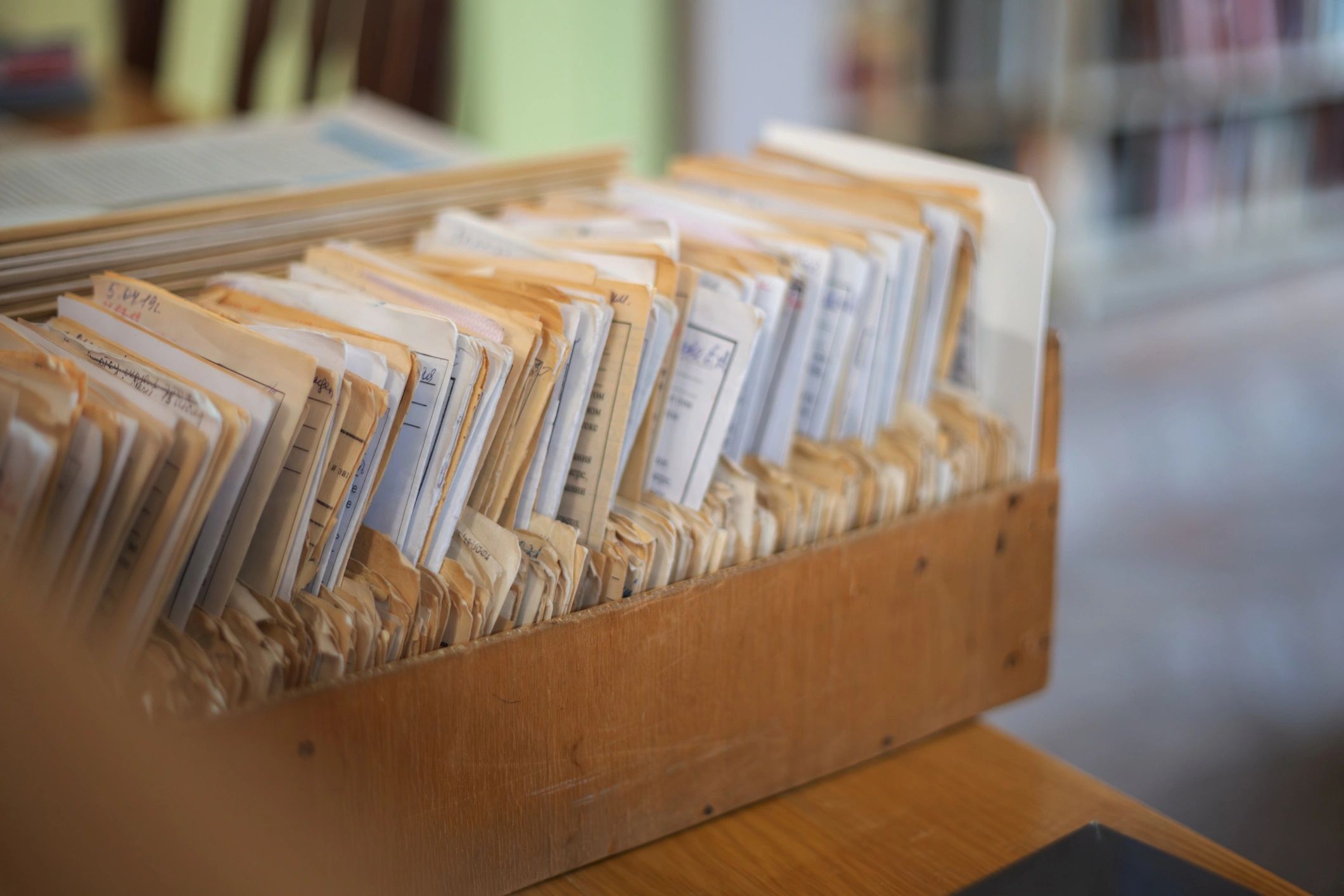 Vintage library card catalog drawer representing organized collections