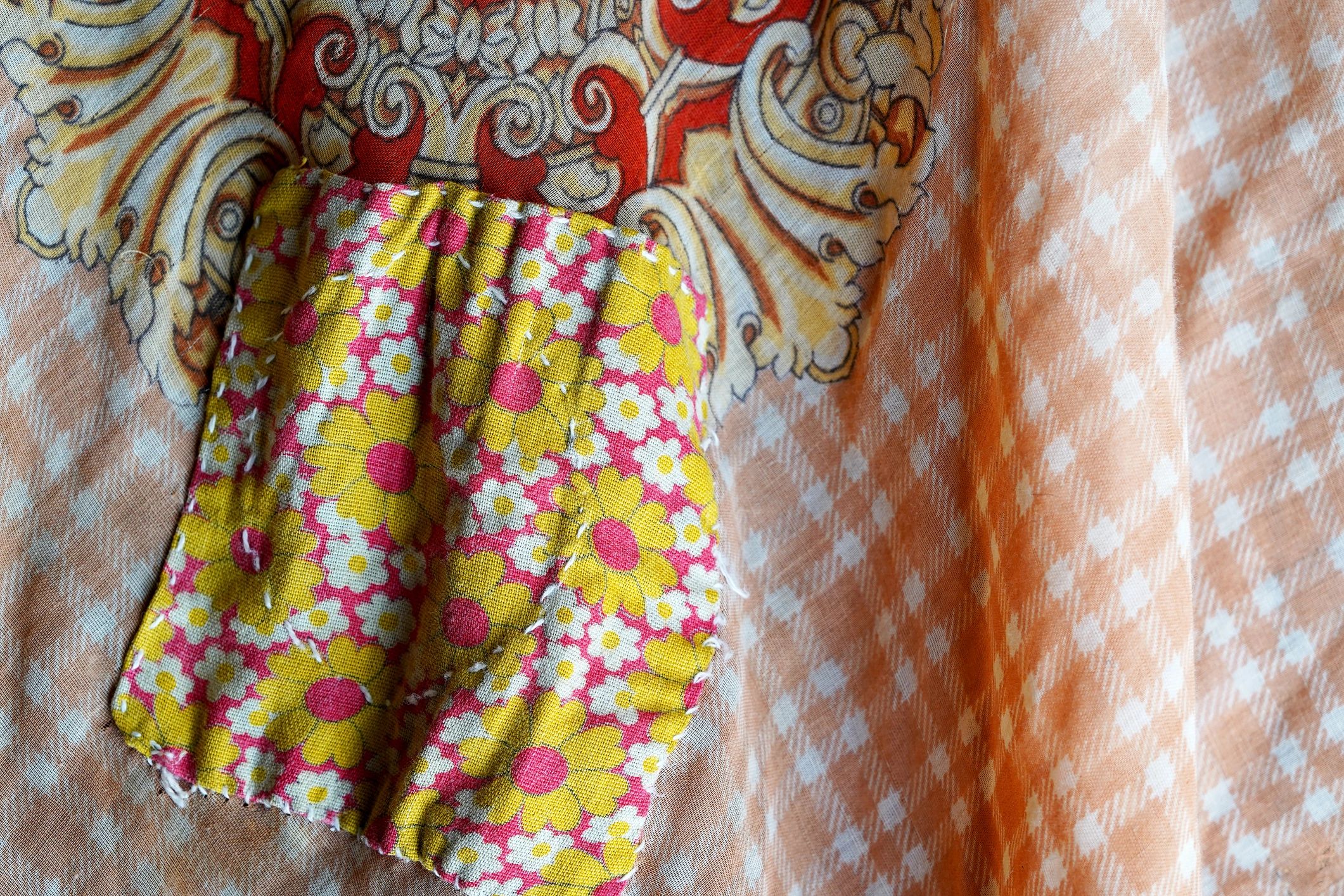 Close-up of hand-stitched textile detail